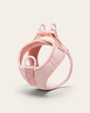 Arnés para perro FURRY MUSE Step & Go en color rosa bebé, fabricado en lycra resistente al agua y malla transpirable.